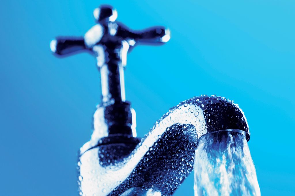 Water Pouring From a Faucet