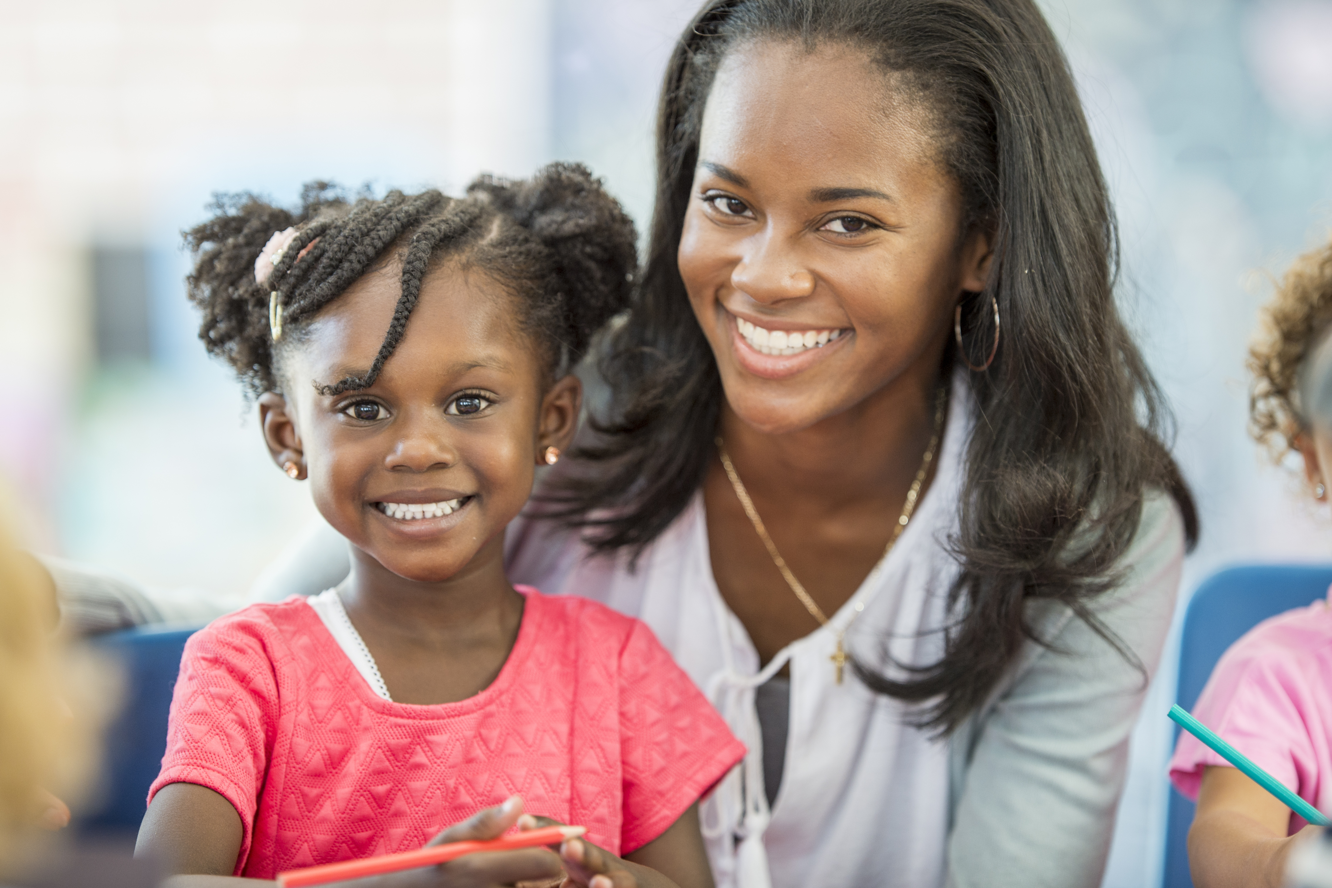 Teacher Helping a Student