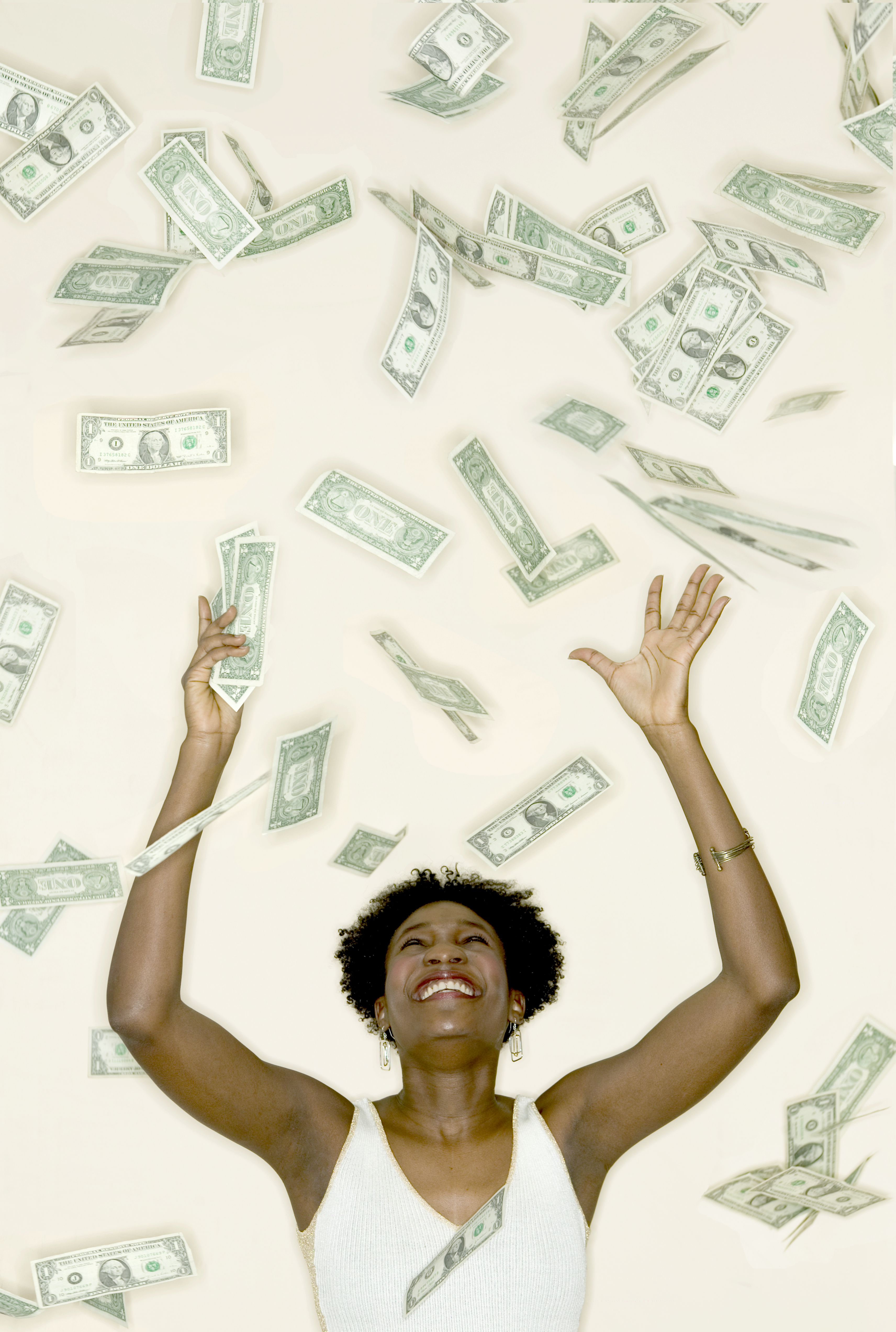 Woman Catching Falling Money