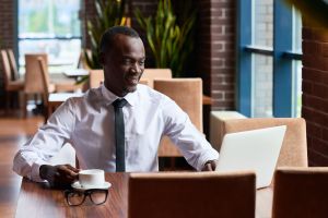 Successful businessman working in restaurant