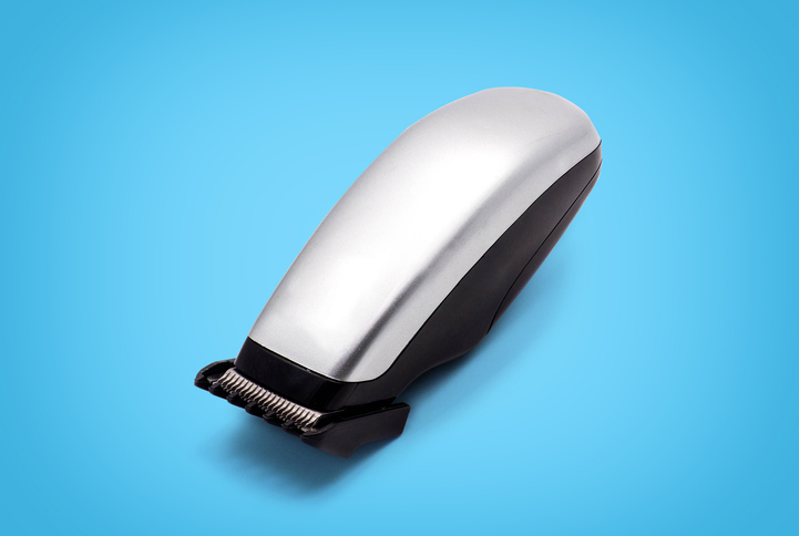 Hair Clipper Against Blue Background