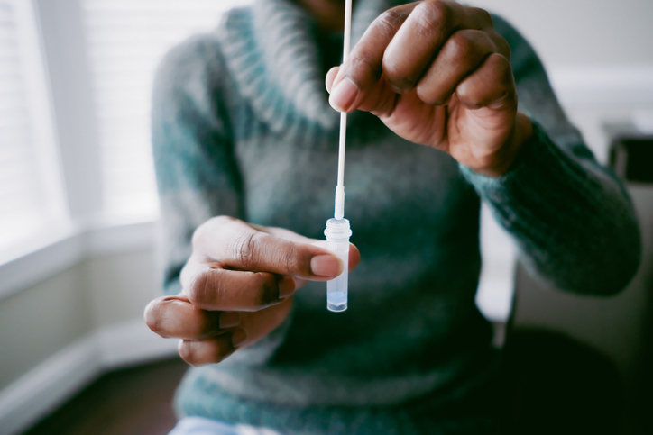 Woman Takes At-Home COVID Test