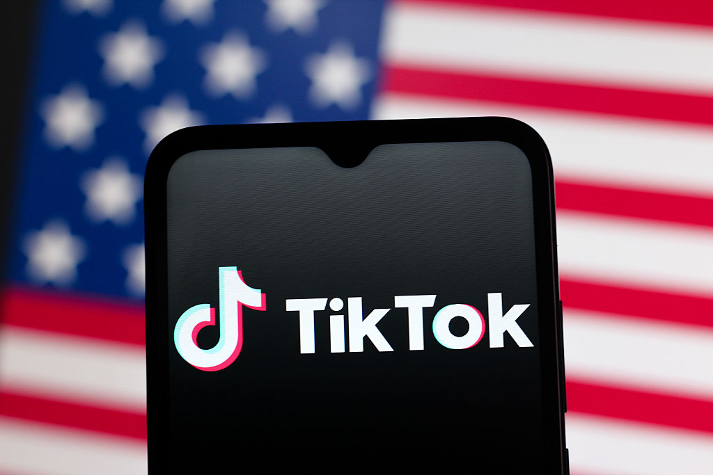 In this photo illustration, the TikTok logo is seen...